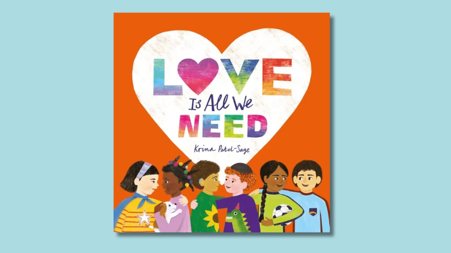 The cover of Love Is All We Need shows a diverse group of children in a line chatting in pairs, underneath a heart with the title on it.
