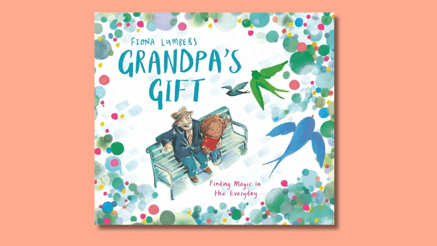 The cover of Grandpa's Gift shows a white Granddad and his mixed-race grandson sitting on a park bench looking up at birds swooping overhead.