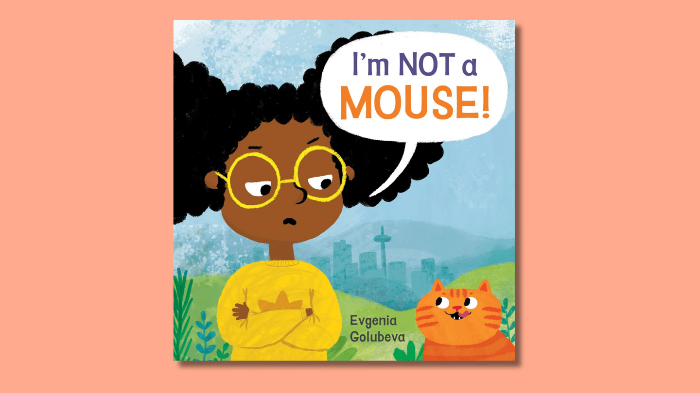 The cover of I'm Not a Mouse shows a young Black girl wearing yellow glasses informing an orange cat, by way of a speech bubble, that she is not a cat. 