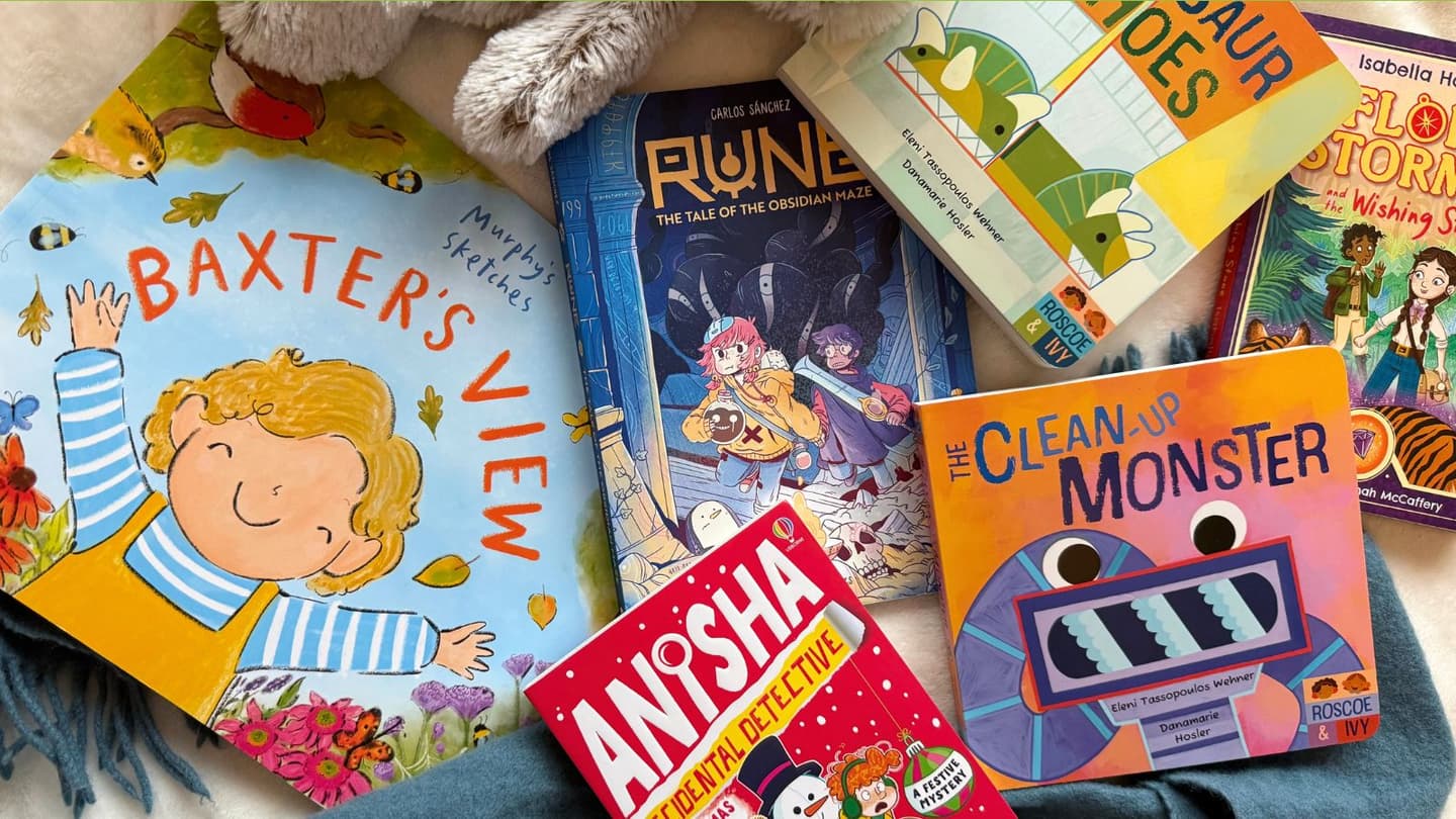 The covers of the best new inclusive children's books published in November 2025 are shown spread out on a blanket.